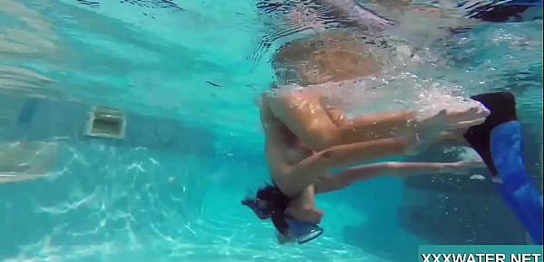  Hot brunette slut Candy swims underwater